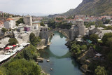 View from the top of the city of Mostar and its famous bridge in a sunny day in summer season