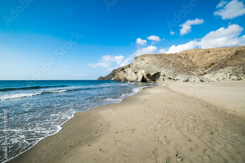 a peaceful beach scene taken at Monsul Beach in Almeria, Spain