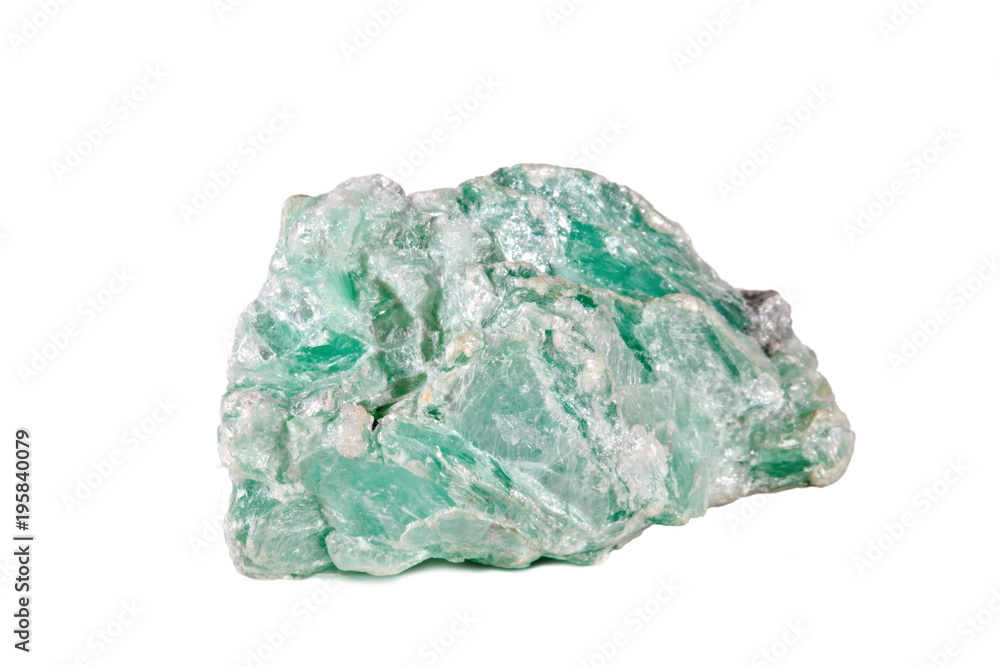 Macro shooting of natural gemstone. The raw mineral is talc. Isolated object on a white background. Macro shooting of natural gemstone. The raw mineral is talc. Isolated object on a white background.