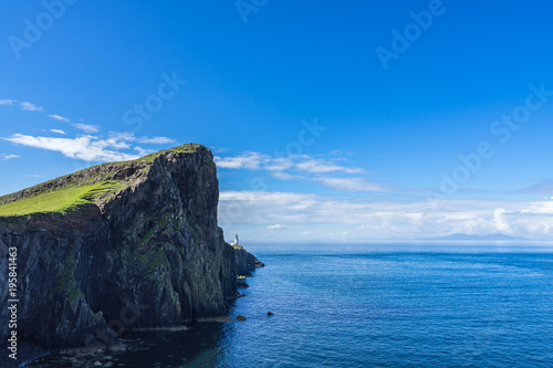 Neist Point Lightouse with scenic cliffs on Atlantic Ocean, Isle of Skye, Scotland, Britain