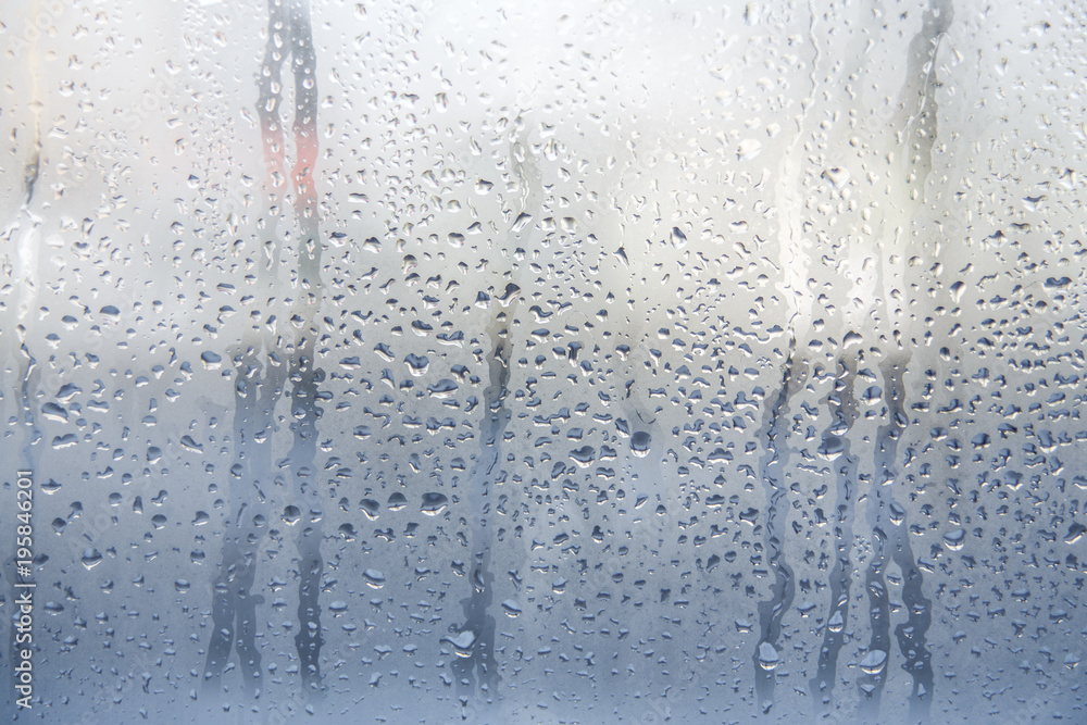Fototapeta premium Rain or water drops on window glasses