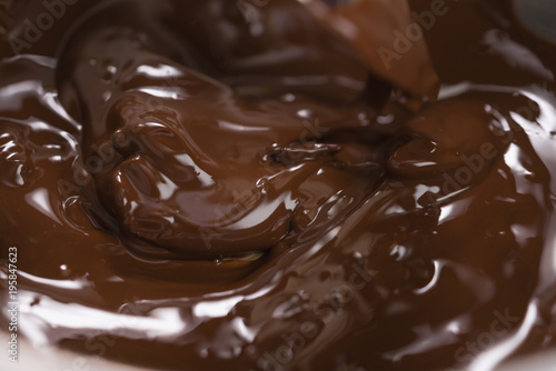 melting dark chocolate in steel bowl