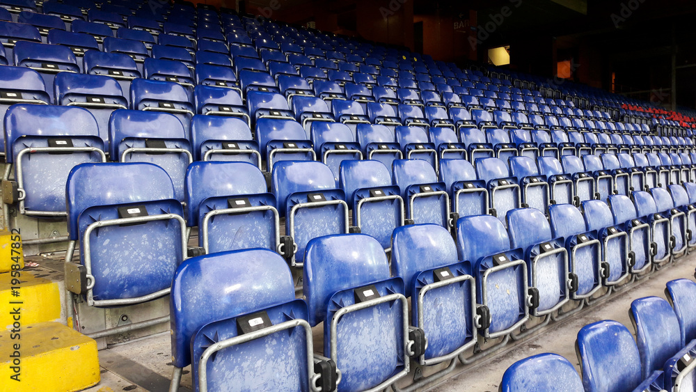 dark-blue-rows-of-seats-in-a-football-stadium-stock-foto-adobe-stock