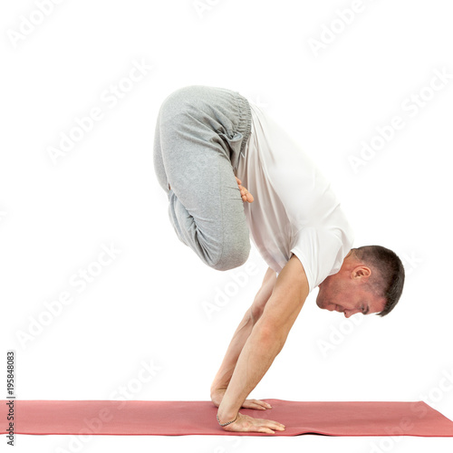 man doing yoga photo