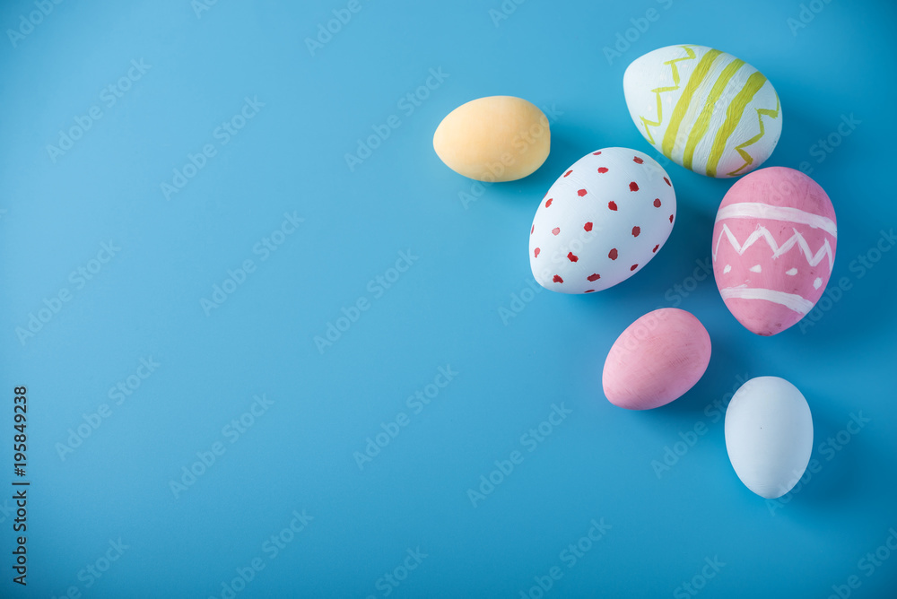 Colorful Easter eggs hand painted on a blue background. Holiday spring card Colorful Easter eggs hand painted on a blue background. Holiday spring card