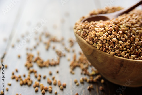 Bowl with raw uncoocked buckwheat