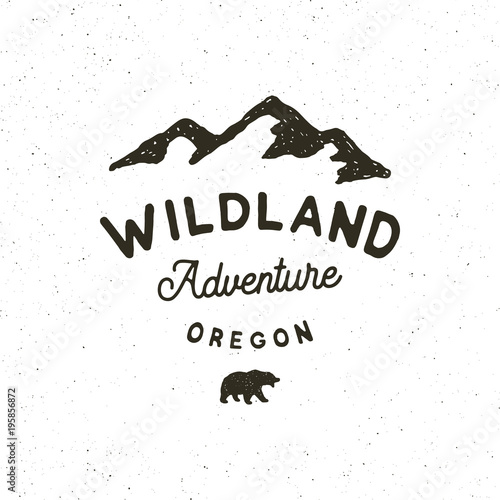 vintage wilderness logo. hand drawn retro styled outdoor adventure emblem. vector illustration