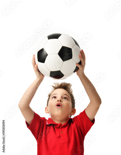 Fan sport boy player hold soccer ball in red t-shirt celebrating happy surprised free text copy space isolated © Dmitry Lobanov