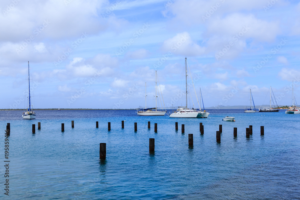 Sailboats Beyond Pilings in Bonaire