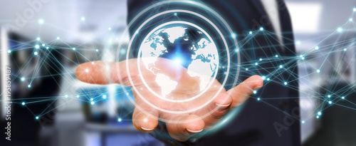 Wallpaper Mural Businessman using planet earth network sphere 3D rendering Torontodigital.ca