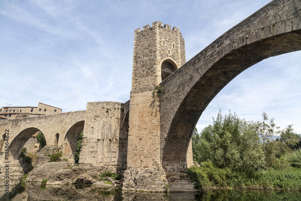 Ancient bridge, romanesque style in medieval village of  Besalu, Garrotxa comarca, province Girona,Catalonia.Spain.