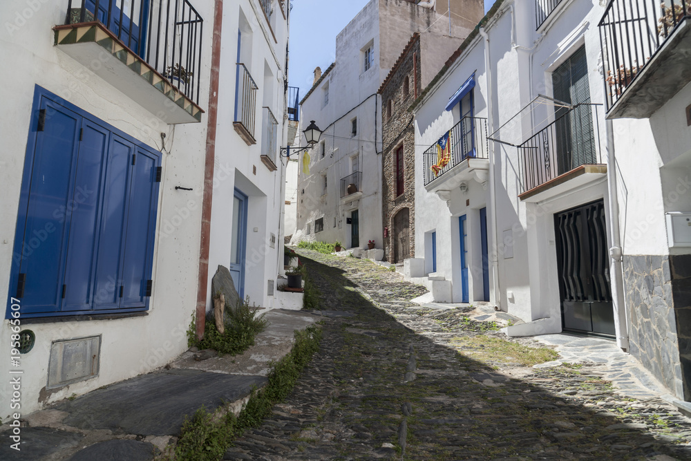 Narrow street in town of Cadaques,Costa Brava, province Girona, Catalonia.Spain.