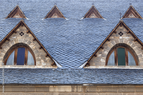 Architecture element, detail windows church, typical mountain construction, slate roof, Ribes de Freser, province Girona, Catalonia.Spain.