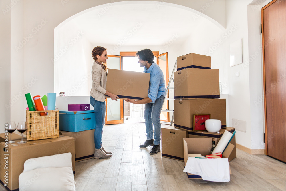 Couple moving into new house Couple moving into new house