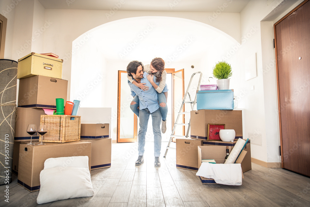 Couple moving into new house Couple moving into new house