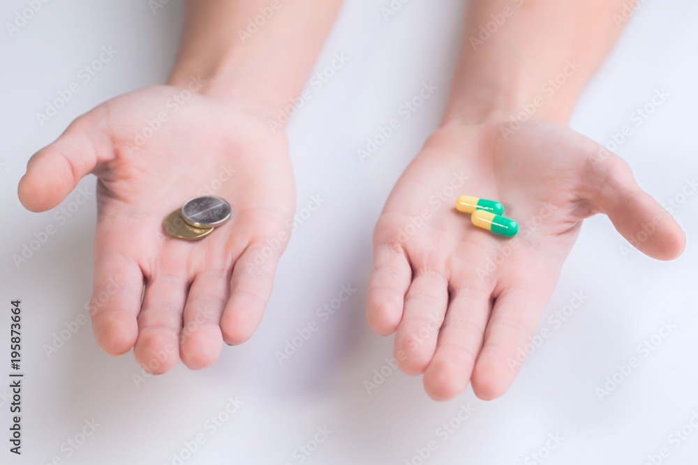Pills in the hand. On a white background. Close-up.