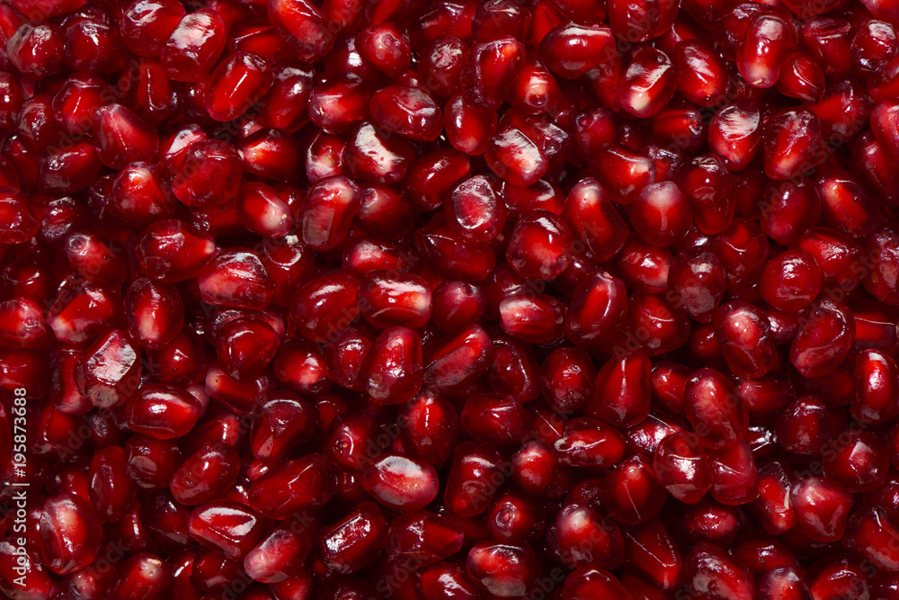 Background with seeds of fresh pomegranate fruit Background with seeds of fresh pomegranate fruit