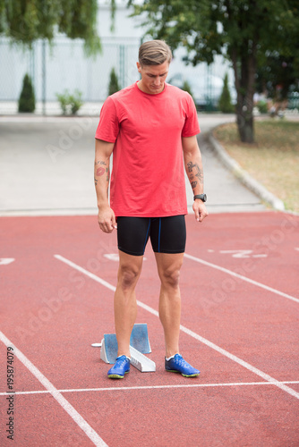 Portrait of Runner Exercising Outside © Jale Ibrak
