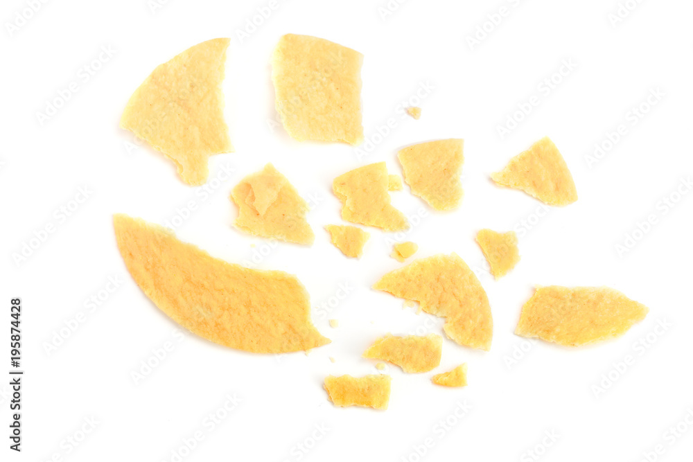 Potato chips crumbs and leftovers isolated over the white background Potato chips crumbs and leftovers isolated over the white background
