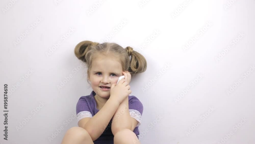 Young cute girl talking on the phone Young cute girl talking on the phone