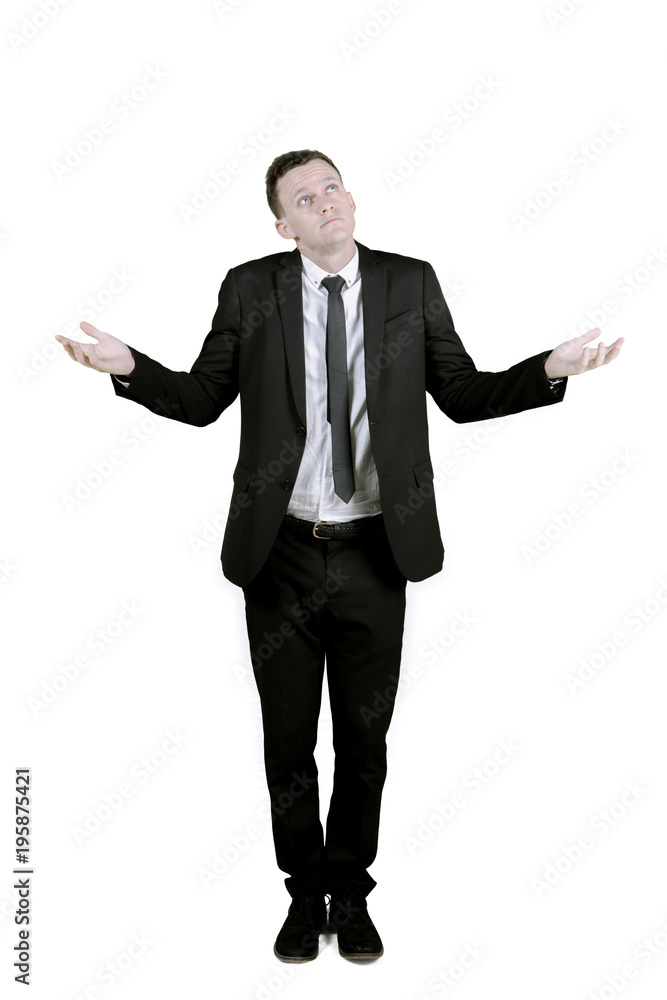 Caucasian businessman with confused expression Caucasian businessman with confused expression