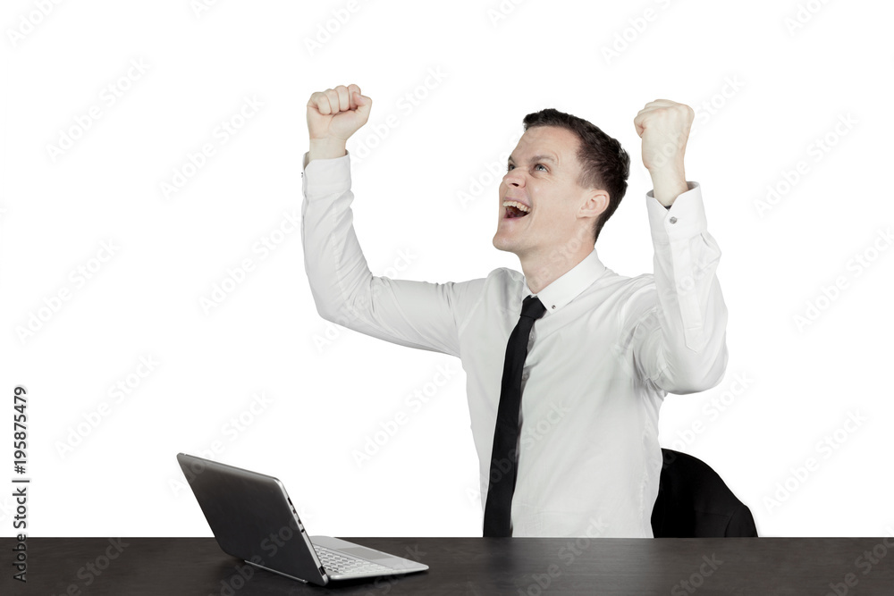 Caucasian businessman expressing his success on studio Caucasian businessman expressing his success on studio