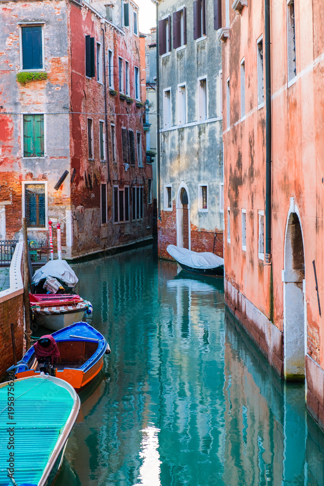 Venice cityscape, narrow water canal