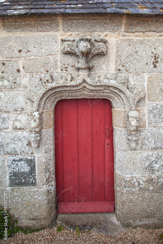 Old medieval decorative red doors photo