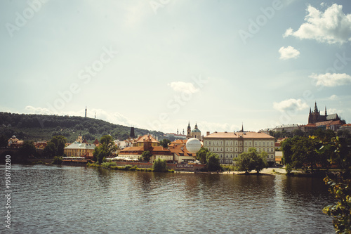 historical architecture view across the river. Prague, Czech Republic