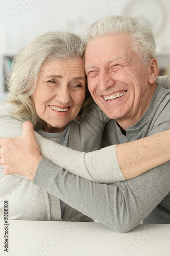 senior couple laughing at home