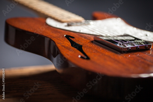 Close up of vintage electric guitar. Musical instrument for jazz , rock and blues styles. Black background