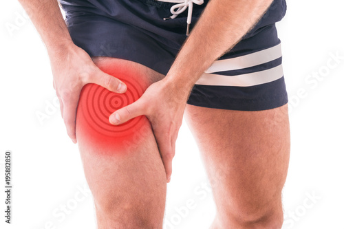 Fototapeta Man with quadriceps pain over white background
