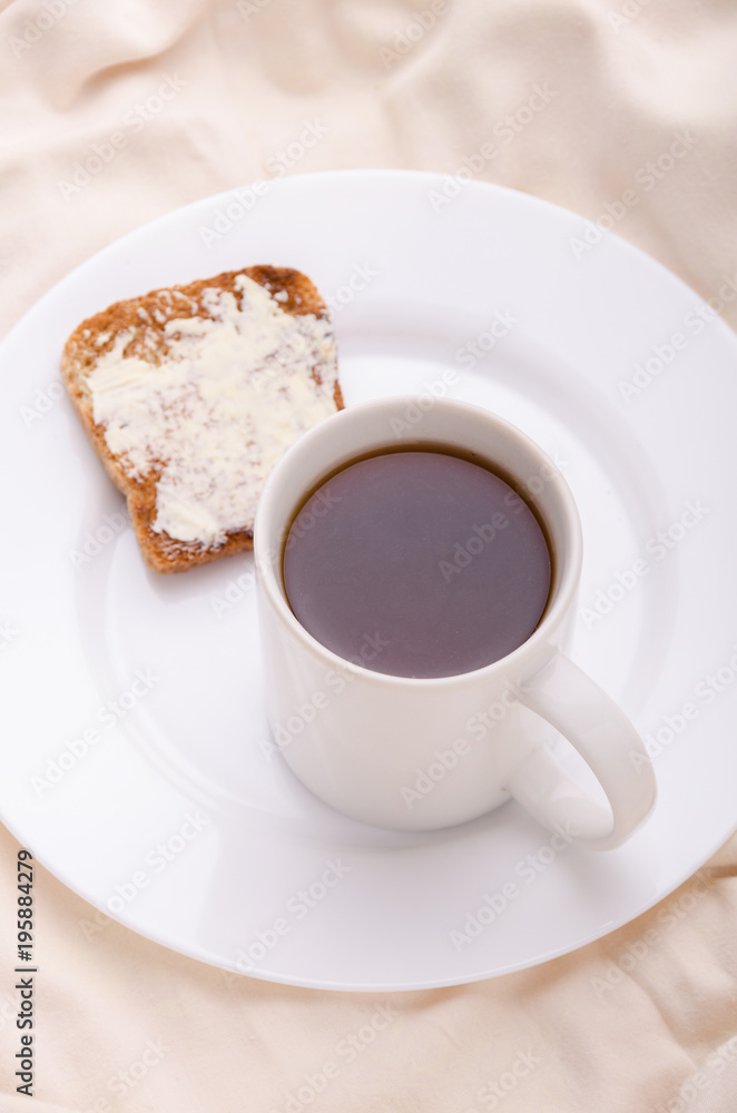 Black tea and toast in bed. Healthy drink. Concept. Black tea and toast in bed. Healthy drink. Concept.