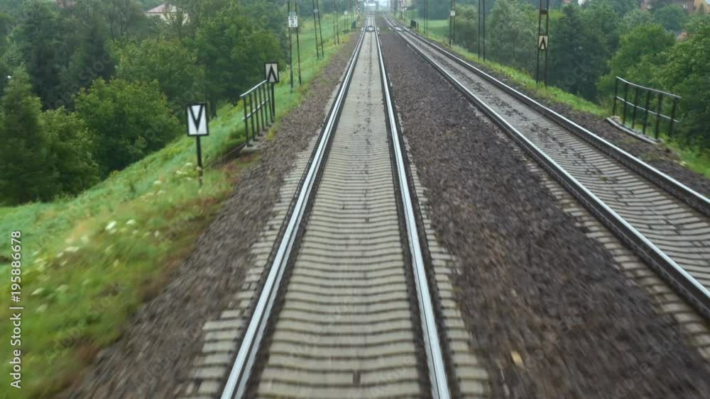 view at the rails of running away train view at the rails of running away train