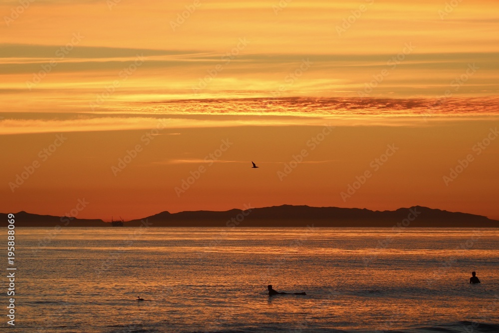 Orange color sunset in Huntington Beach california