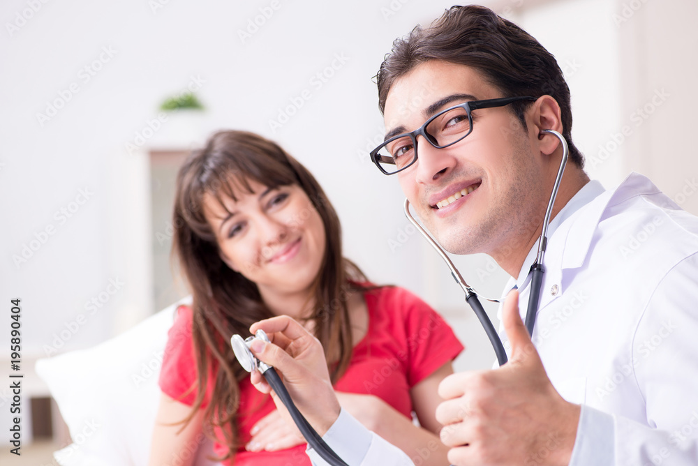 Pregnant woman patient visiting doctor for regular check-up Pregnant woman patient visiting doctor for regular check-up