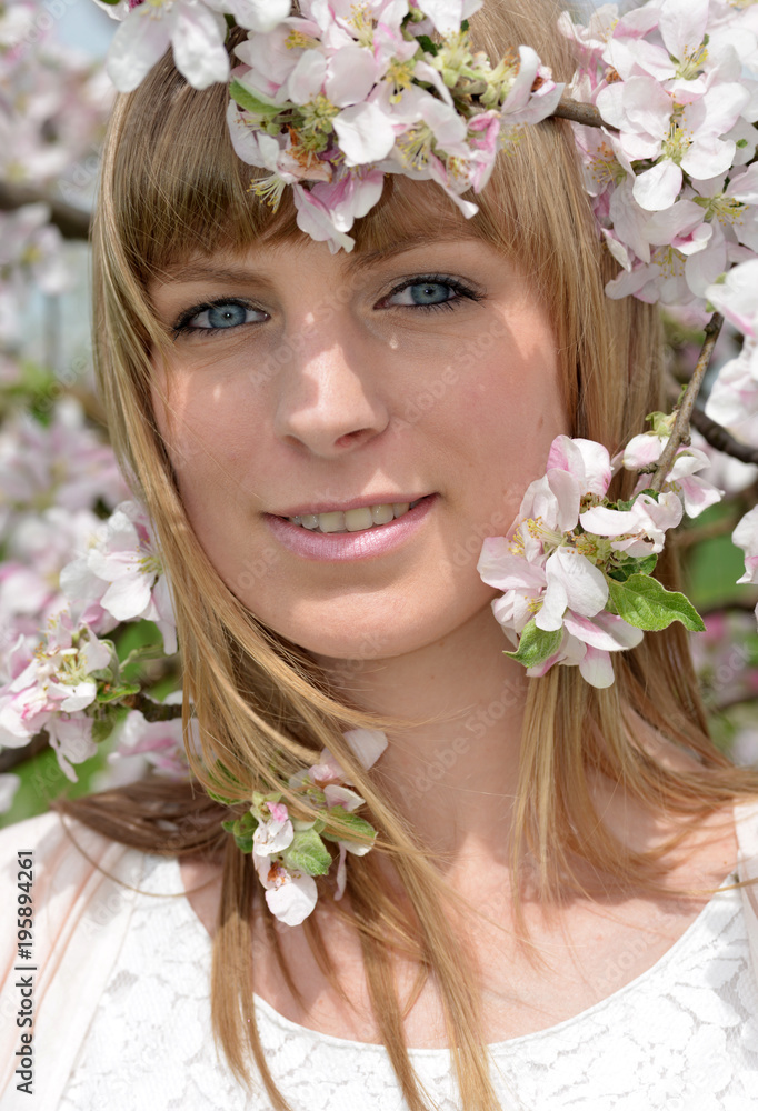 Naklejka premium young Woman and blooming spring