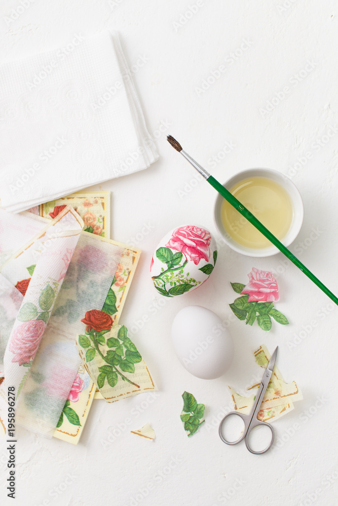 Decoupage on white eggs. The decoration of eggs for Easter. Decoupage on white eggs. The decoration of eggs for Easter.