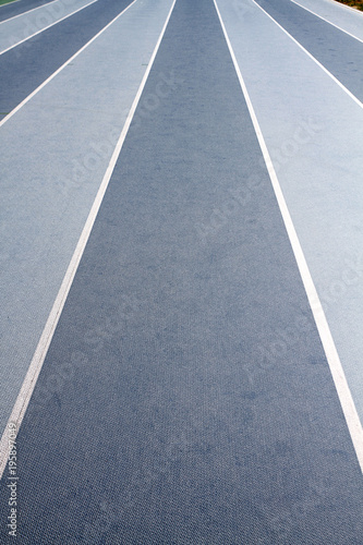 Background image of blue lanes on a running circuit © Sebastian