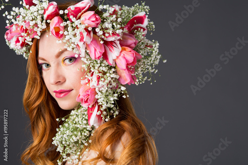  woman with wearing a wreath of tulips