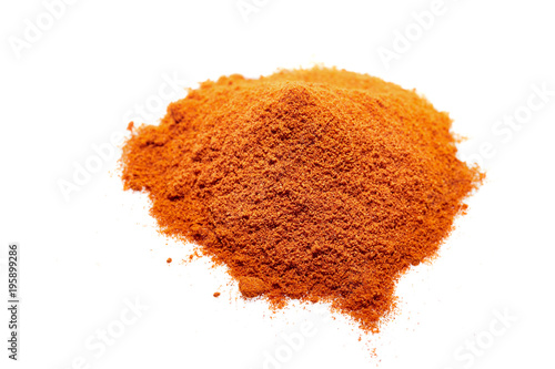Red ground paprika isolated on white background, shallow depth of field, backlight.