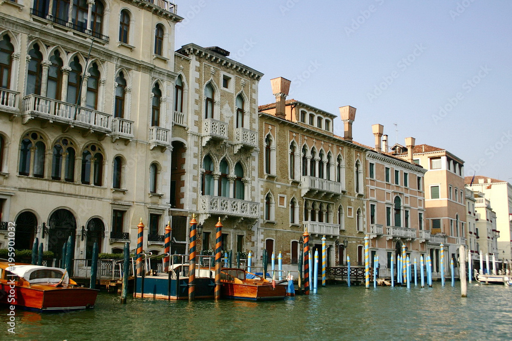 Venice landscape with canal, boats and buildings Italy