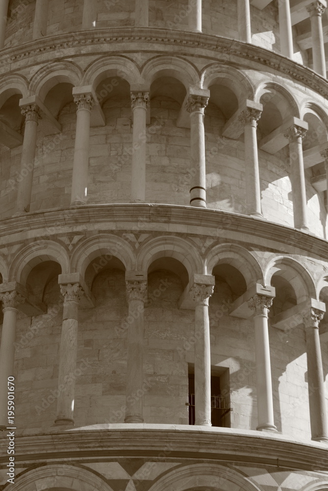 white stone facade of Pisa tower Italy