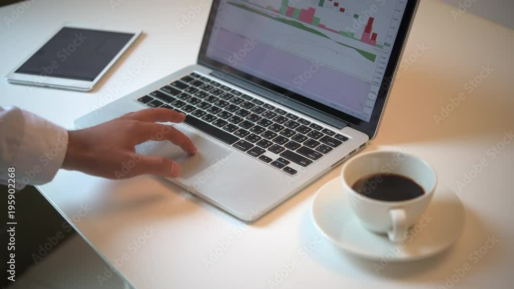 Business Man using Computer Laptop ,Tablet PC and Mobile phone in Coffee Cafe Concept Business Man using Computer Laptop ,Tablet PC and Mobile phone in Coffee Cafe Concept