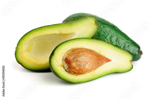 avocado and half isolated on white background close-up