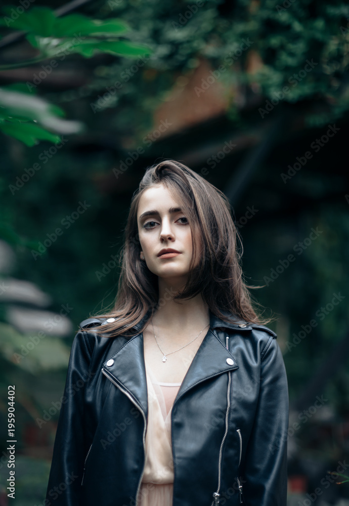 Fashion portrait of beautiful stylish woman in leather jacket Fashion portrait of beautiful stylish woman in leather jacket