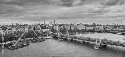 London, United Kingdom, February 17, 2018: Aerial cityscape over the river Thames near Haugerford Bridge with Charing Cross Station, Black and White