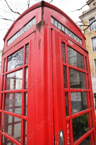 red telephone box on the street of London city  Great Britain  United Kingdom