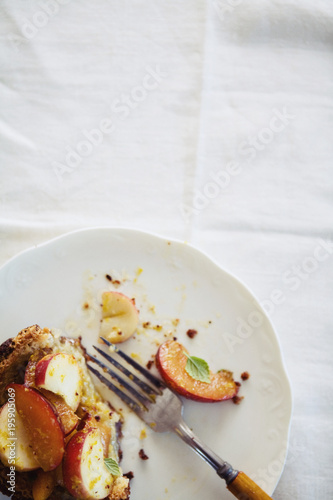 Eaten tart with peaches and stone fruit