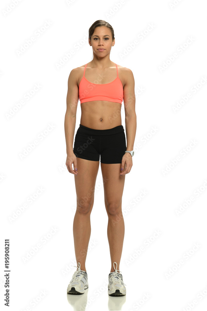 Woman athete standing Woman athete standing